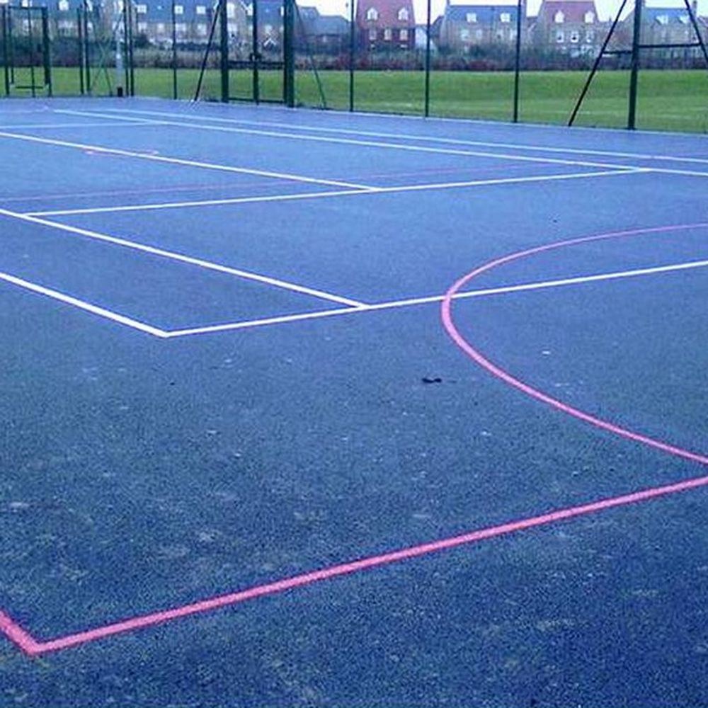 Colour-coated sports court with crisp white court lines